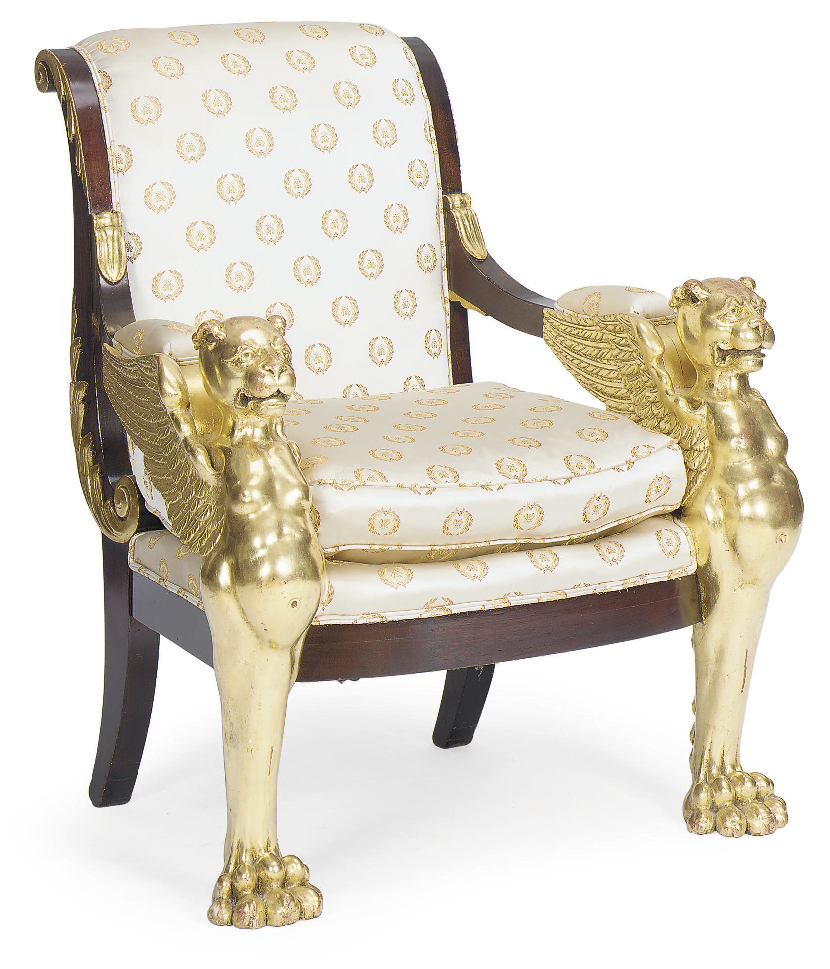 A CONTINENTAL EMPIRE MAHOGANY AND PARCEL-GILT ARMCHAIR,