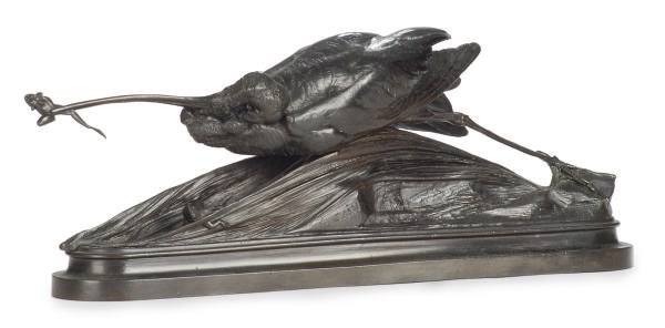 A PATINATED BRONZE FIGURE OF A SHORE BIRD AND FROG,