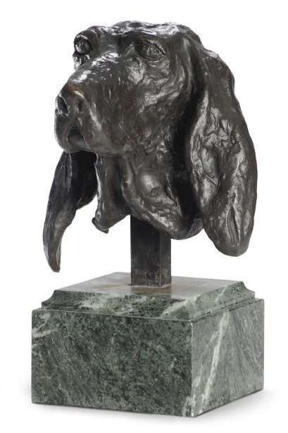 A PATINATED BRONZE BUST OF A DOG,