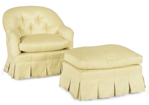 A YELLOW UPHOLSTERED LOUNGE CHAIR AND OTTOMAN,