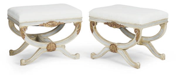 A PAIR OF CREAM-PAINTED AND PARCEL-GILT CURULE-FORM STOOLS,