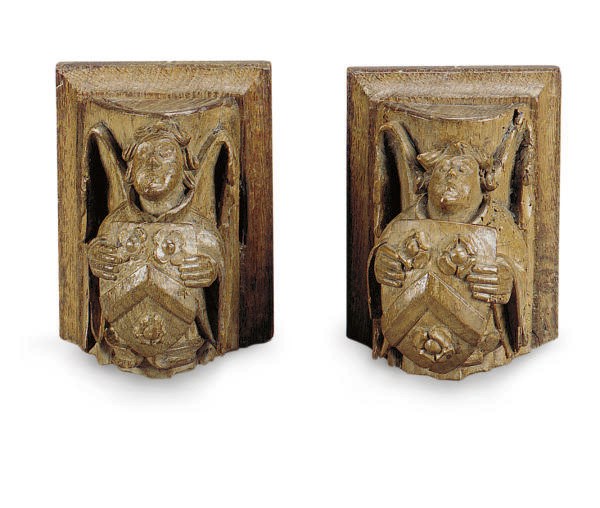 TWO PAIRS OF CARVED OAK WALL MOUNTS,
