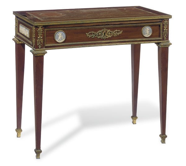 A FRENCH ORMOLU AND PORCELAIN MOUNTED MAHOGANY TABLE A ECRIRE,