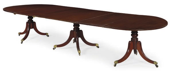 A MAHOGANY THREE-PEDESTAL DINING-TABLE,