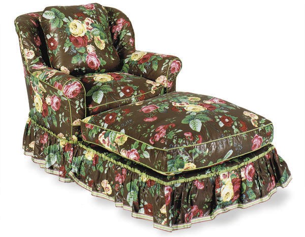 A PAIR OF CLUB CHAIRS WITH AN OTTOMAN,