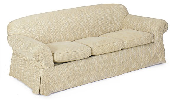 A STAINED WOOD AND UPHOLSTERED SOFA
