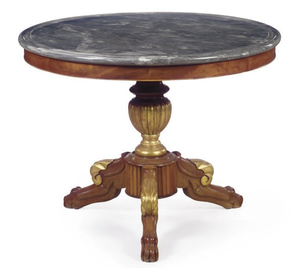 A NORTH EUROPEAN MAHOGANY AND PARCEL-GILT CENTER TABLE,