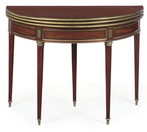 A LOUIS XVI BRASS-MOUNTED MAHOGANY TRIPLE FOLDING GAMES TABLE,
