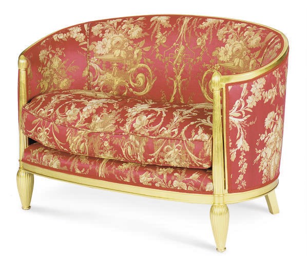 A GILTWOOD AND UPHOLSTERED SETTEE,