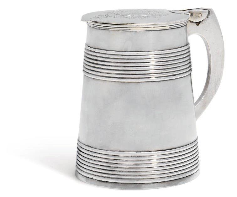A GEORGE III SILVER TANKARD