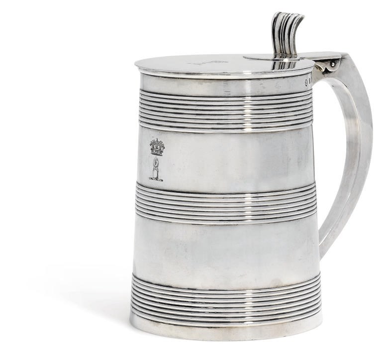 A GEORGE III SILVER TANKARD