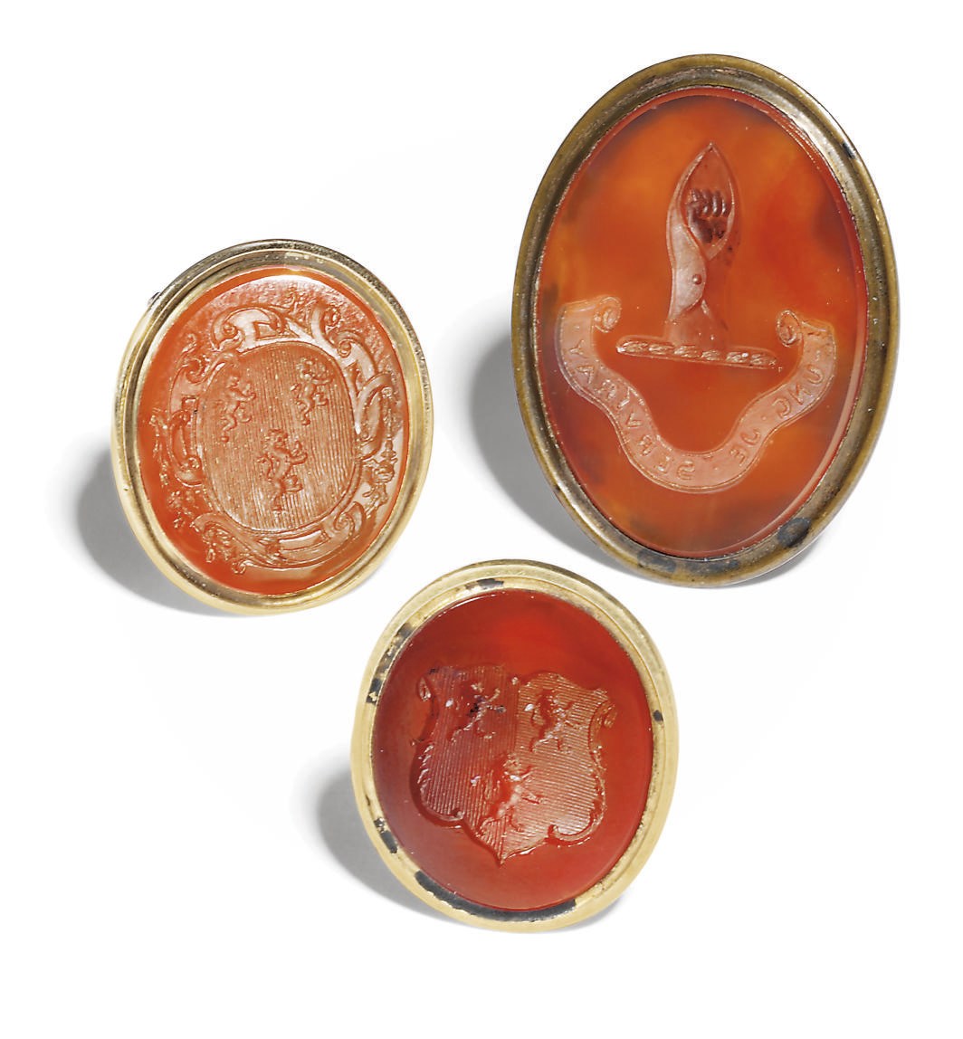THREE GOLD AND BRASS-MOUNTED FOB SEALS