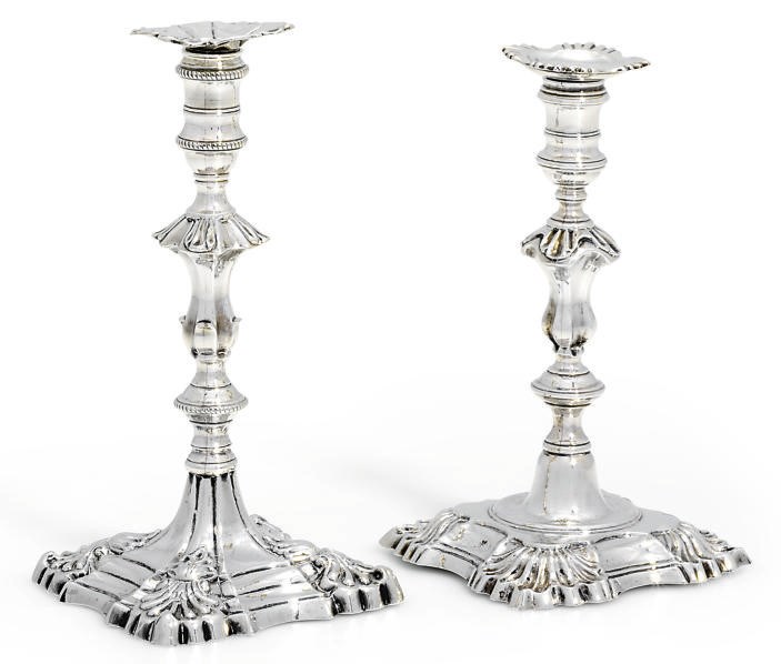 A GEORGE II SILVER TAPERSTICK AND A GEORGE III SILVER TAPERSTICK