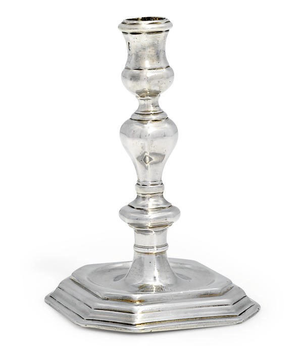A QUEEN ANNE SILVER CANDLESTICK