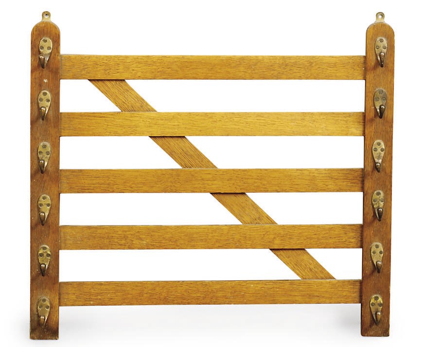 A LATE VICTORIAN OAK WHIP-RACK