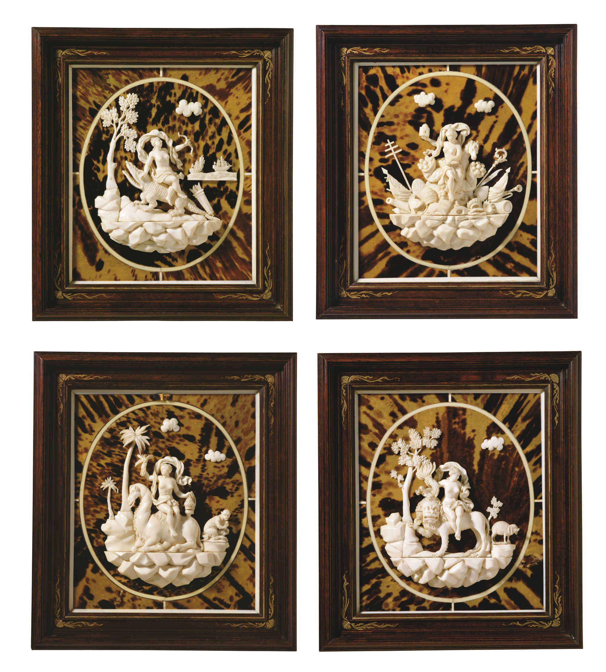 SUITE DE QUATRE BAS RELIEFS REPRESENTANT LES QUATRE CONTINENTS