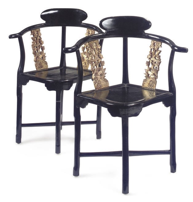 A PAIR OF CHINESE EBONISED AND GILT DECORATED CORNER CHAIRS