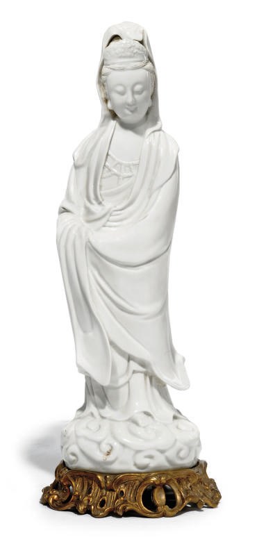 A CHINESE BLANC-DE-CHINE ORMULU MOUNTED FIGURE OF GUANYIN