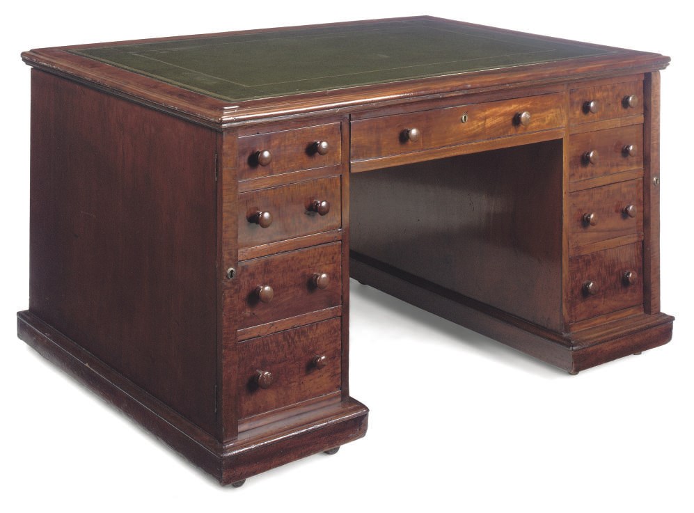 AN EARLY VICTORIAN MAHOGANY PARTNER'S DESK