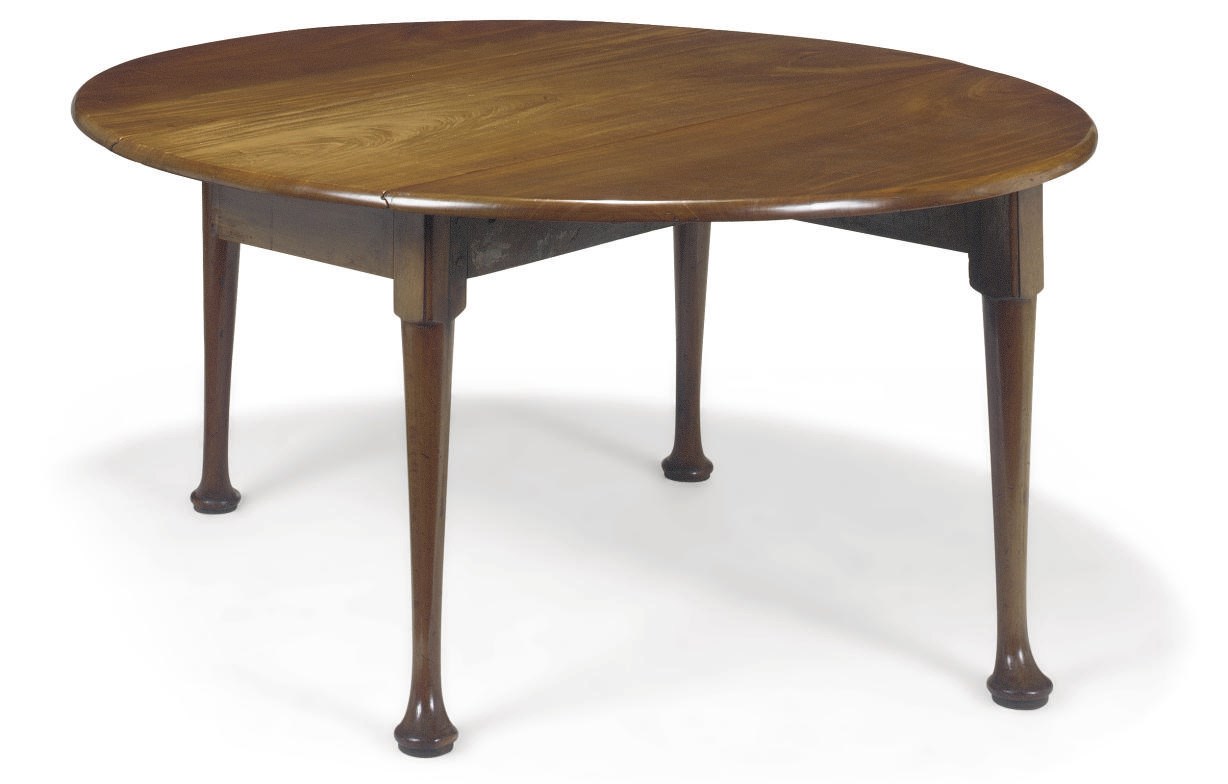 A GEORGE II MAHOGANY DROP-LEAF GATE-LEG DINING TABLE