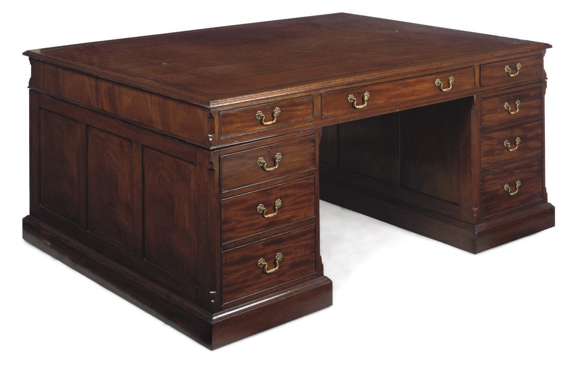 A LARGE MAHOGANY PARTNER'S DESK