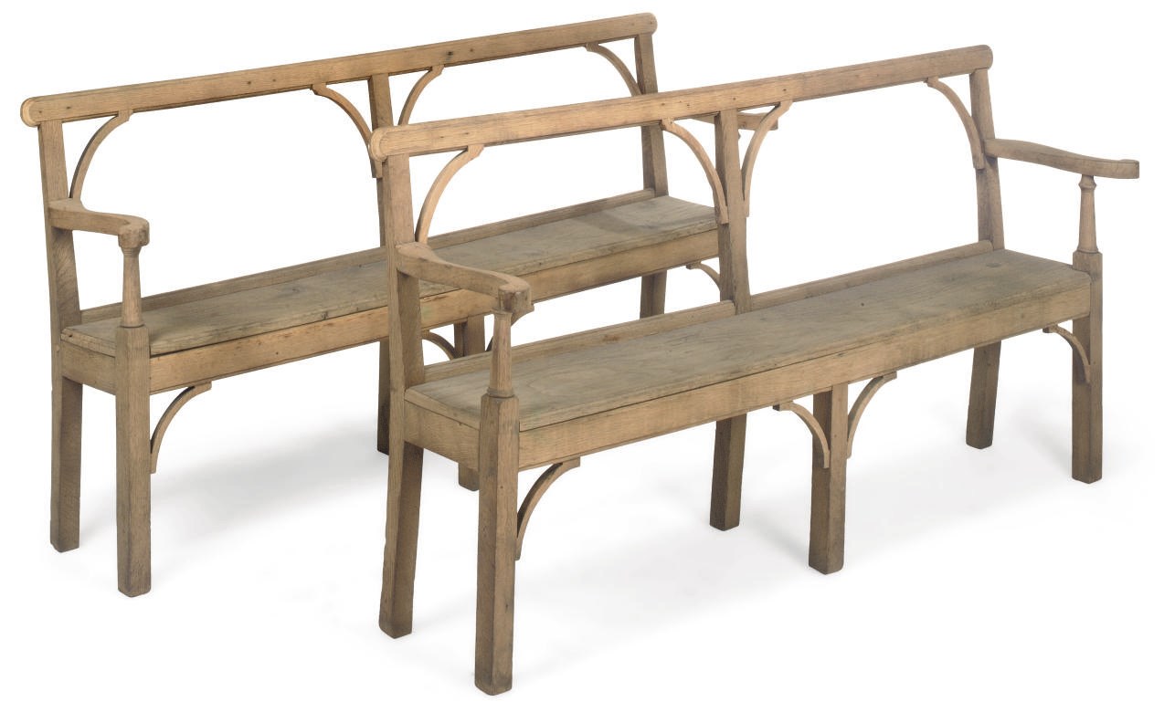 A NEAR PAIR OF OAK GARDEN BENCHES