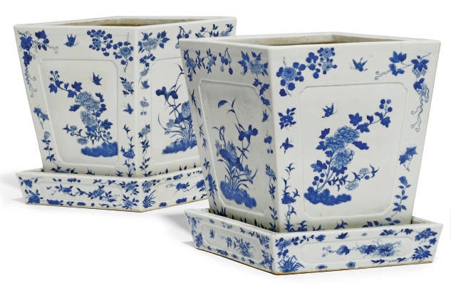 A PAIR OF CHINESE BLUE AND WHITE DIAMOND FORMED JARDINERES AND STANDS