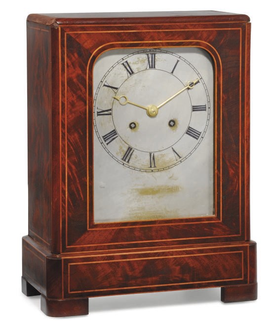 A CHARLES X MAHOGANY STRIKING MANTEL CLOCK