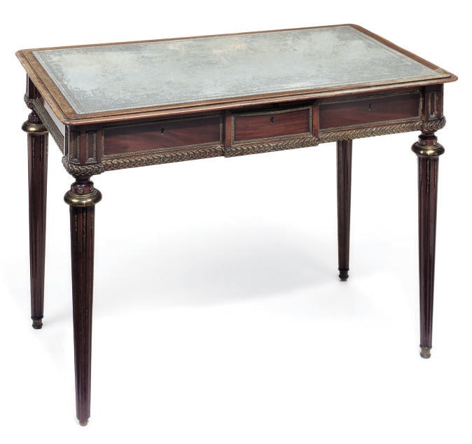 A MAHOGANY AND GILT-METAL MOUNTED WRITING TABLE