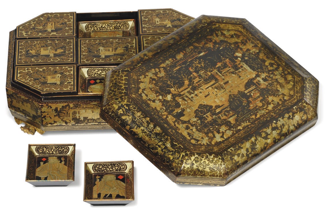 A CHINESE BLACK AND GILT LACQUERED GAMES BOX