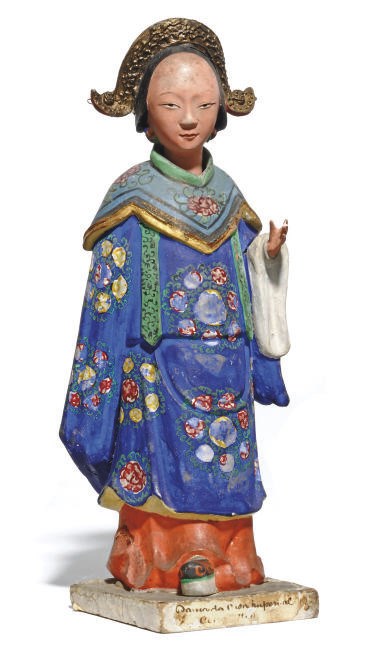 A CHINESE EXPORT PAINTED POTTERY NODDING-HEAD FIGURE