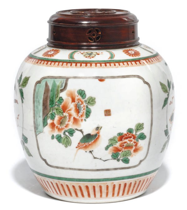 A CHINESE FAMILLE VERTE JAR AND WOOD COVER