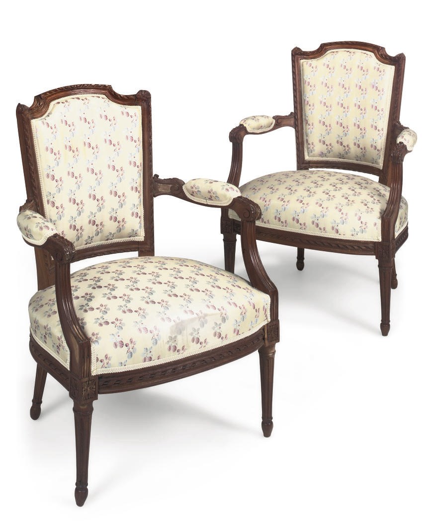 A PAIR OF FRENCH WALNUT FAUTEUILS