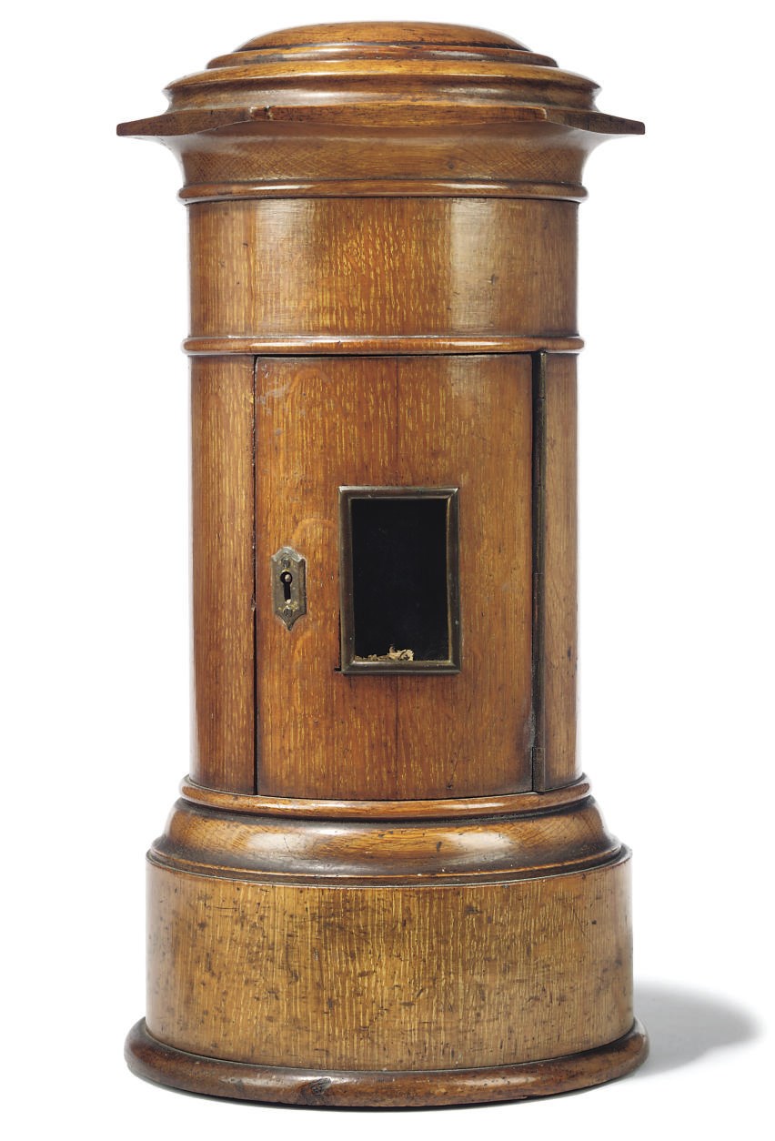 A VICTORIAN OAK PILLAR-BOX LETTER BOX