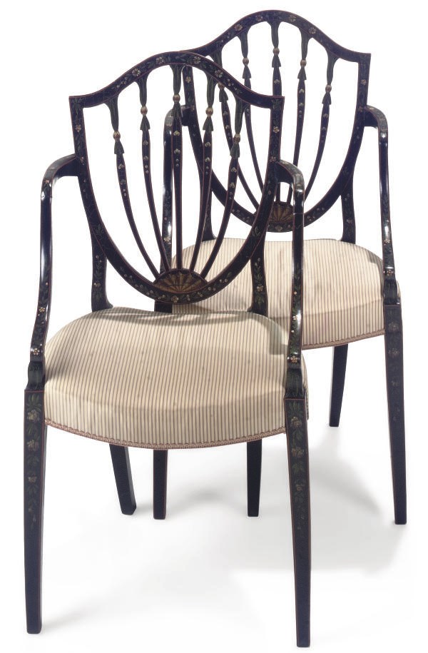 A PAIR OF GEORGE III BLACK AND POLYCHROME-PAINTED ARMCHAIRS