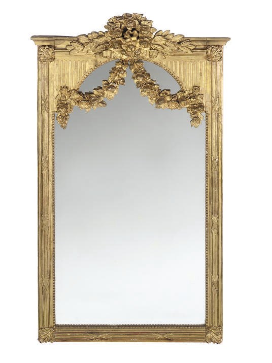 A FRENCH OR ITALIAN GILTWOOD AND COMPOSITION MIRROR