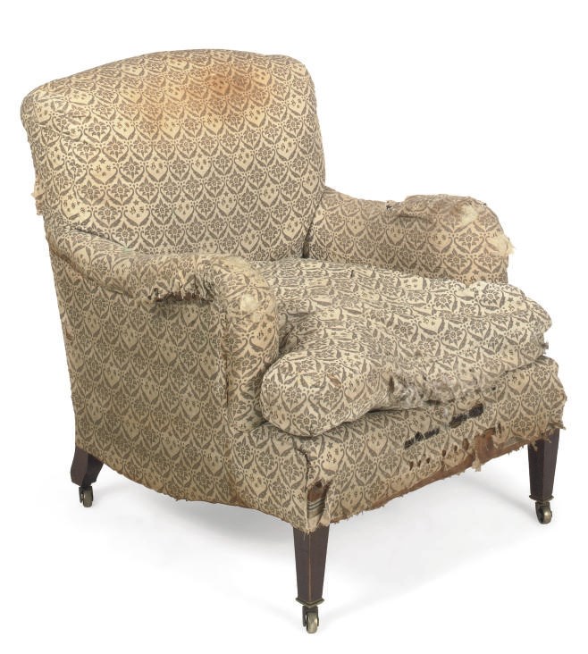 A LATE VICTORIAN HOWARD MAHOGANY ARMCHAIR