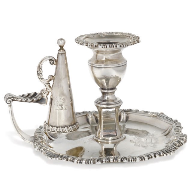 A GEORGE III SILVER CHAMBERSTICK