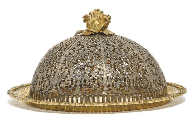 A PARCEL-GILT METALWARE CAKE DISH AND COVER