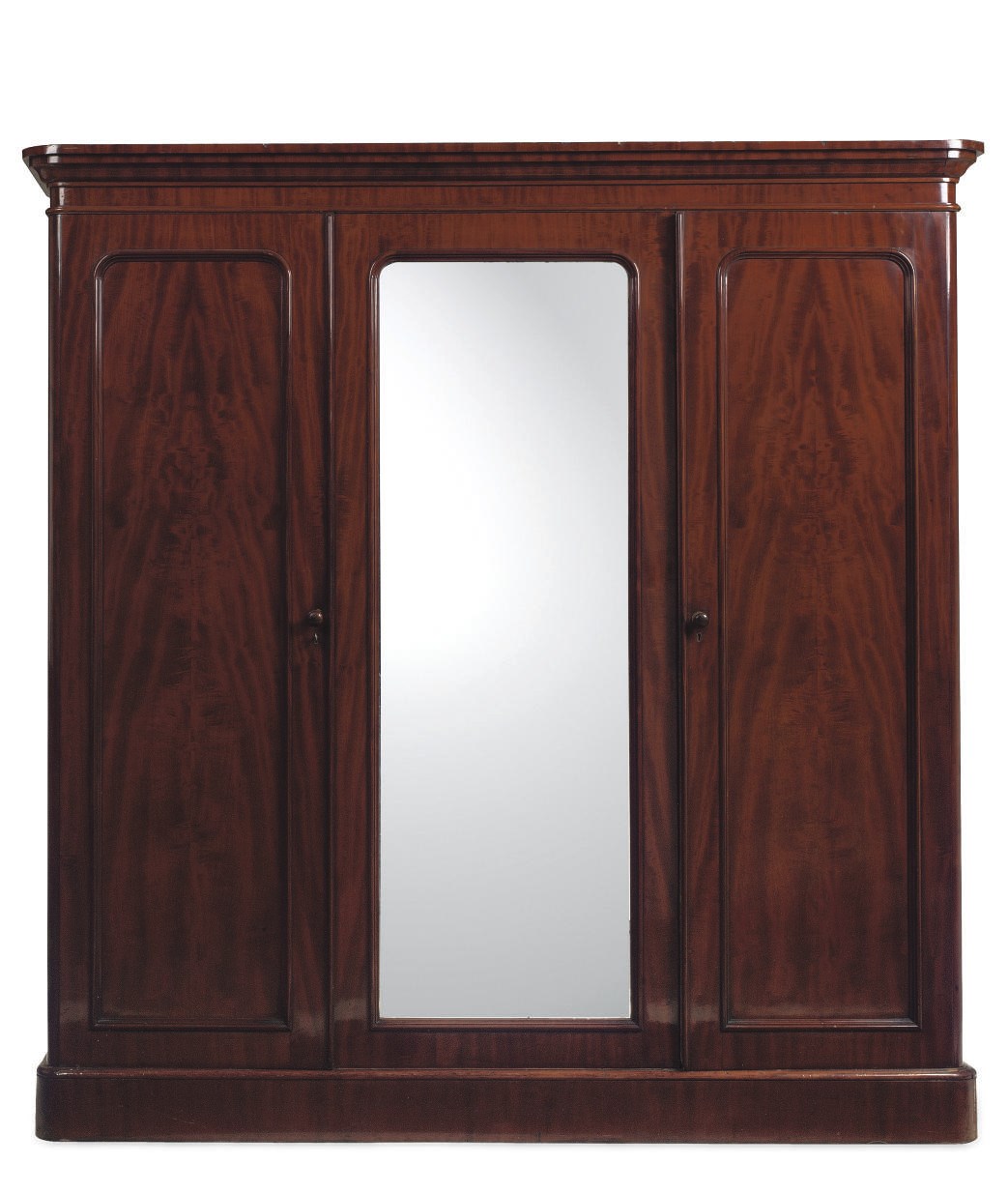 A MID-VICTORIAN MAHOGANY TRIPLE WARDROBE