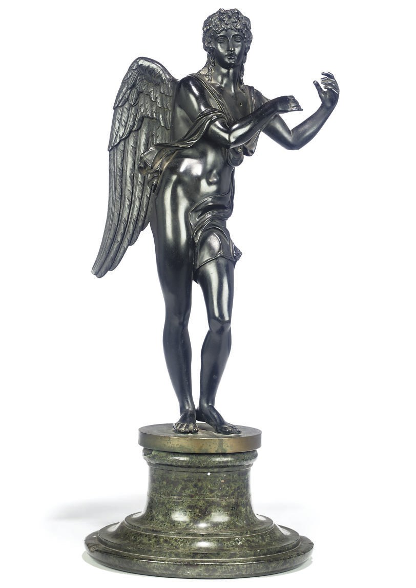A BRONZE FIGURE OF AN ANGEL