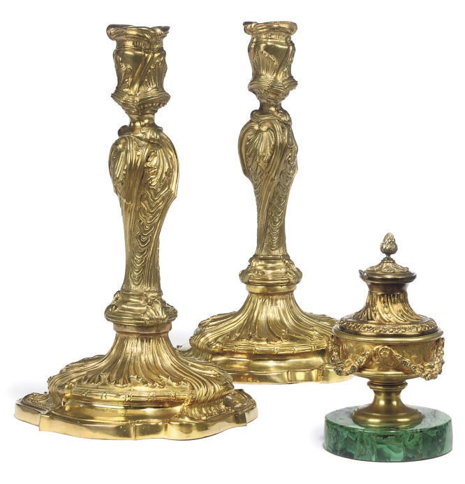 A PAIR OF FRENCH GILT-BRONZE CANDLESTICKS