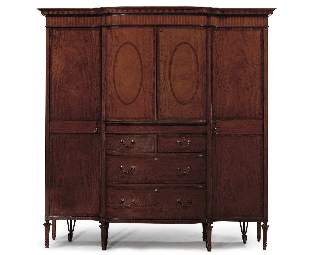 AN EDWARDIAN ROSEWOOD BANDED AND MOULDED BREAKFRONT WARDROBE