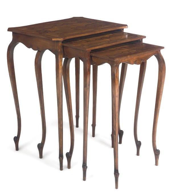 A NEST OF THREE FRUITWOOD AND TULIPWOOD CROSSBANDED OCCASONAL TABLES