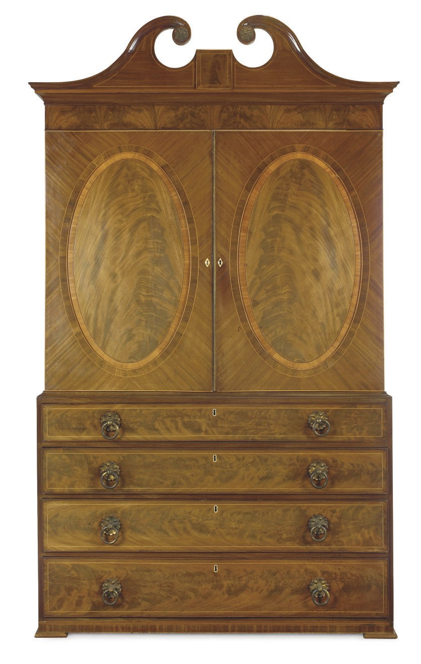 A REGENCY CHANNEL ISLANDS MAHOGANY AND SATINWOOD AND EBONY INLAID LINEN PRESS