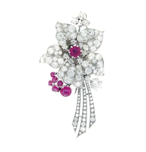 A DIAMOND, RUBY AND PLATINUM BROOCH