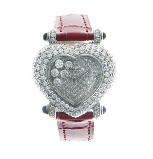 A DIAMOND AND 18K WHITE GOLD "HAPPY DIAMOND" WATCH, BY CHOPARD
