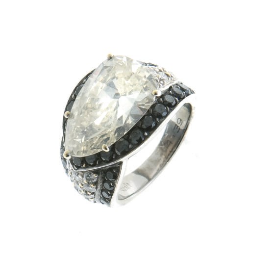 A DIAMOND, COLORED DIAMOND AND WHITE GOLD RING, BY GRAFF