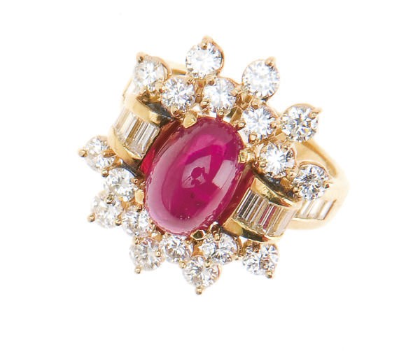 A RUBY, DIAMOND AND 18K GOLD RING