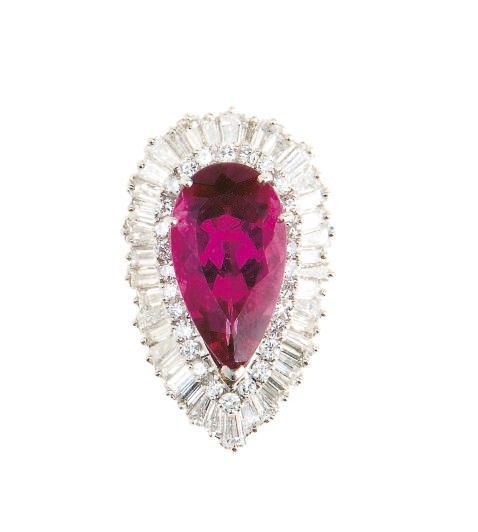 A PINK TOURMALINE, DIAMOND, PLATINUM AND WHITE GOLD RING